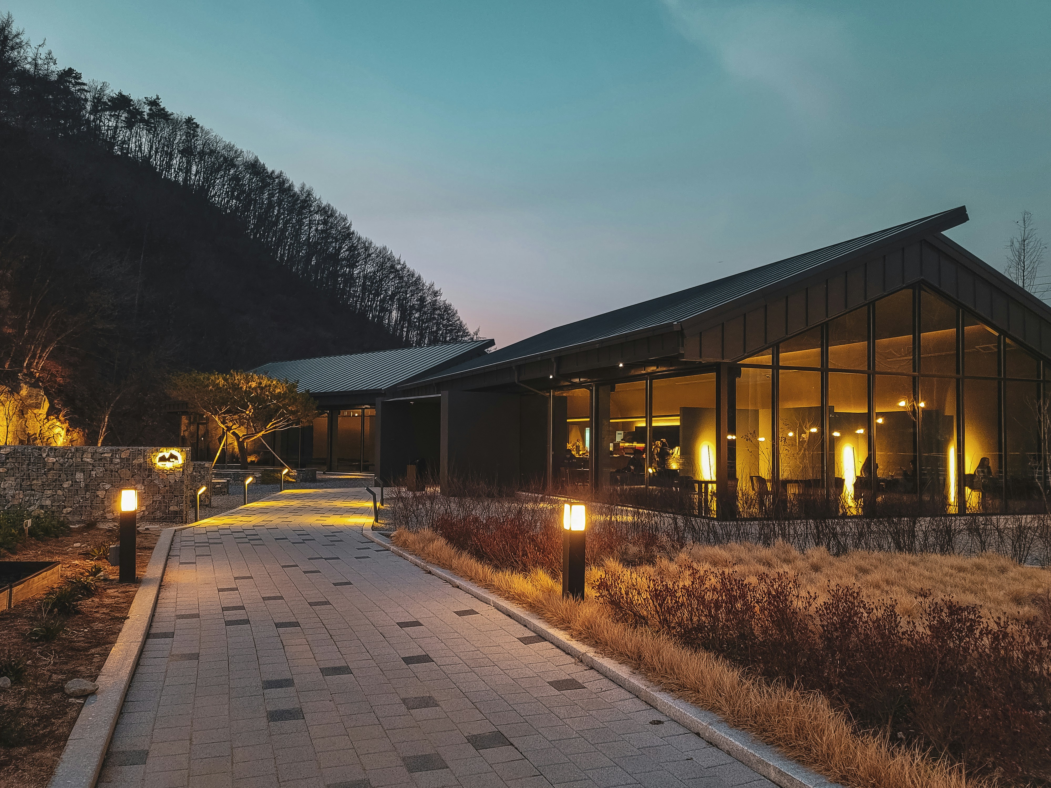 Illuminated lodge at twilight